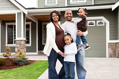 image of family out in front of house